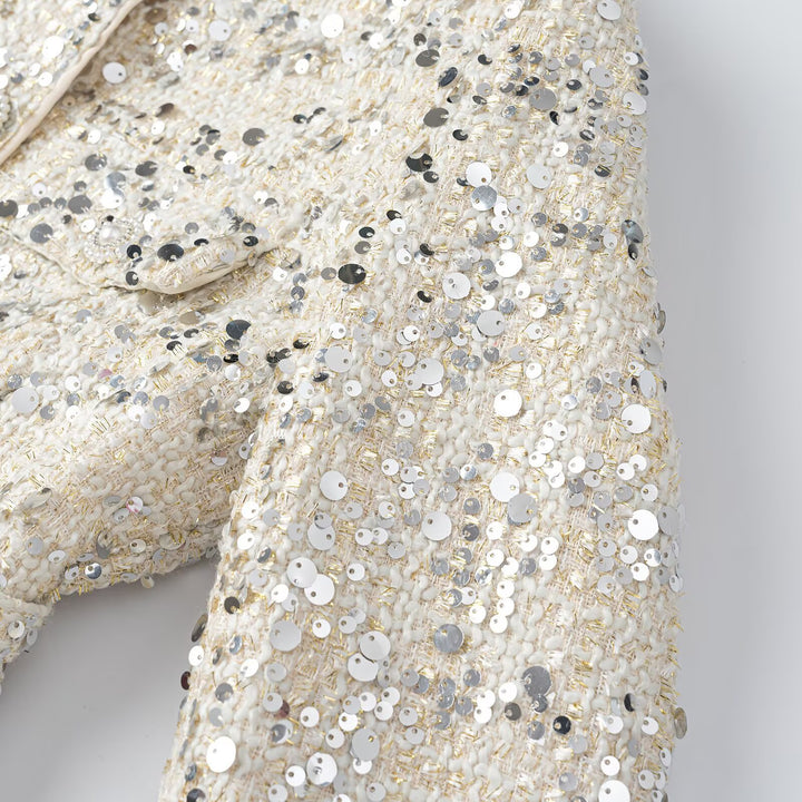 Women's short jacket made of bouclé with sequin trim, decorative pearl buttons, and a belted waist Amarae