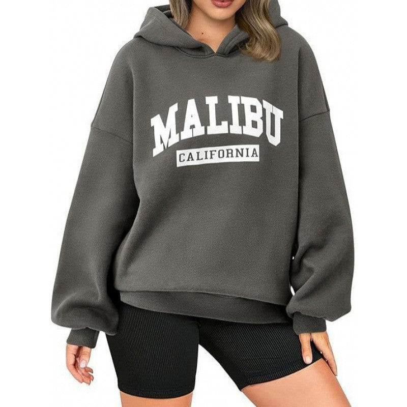 Women's casual hoodie with oversized cut and eye-catching print Chic & Stil