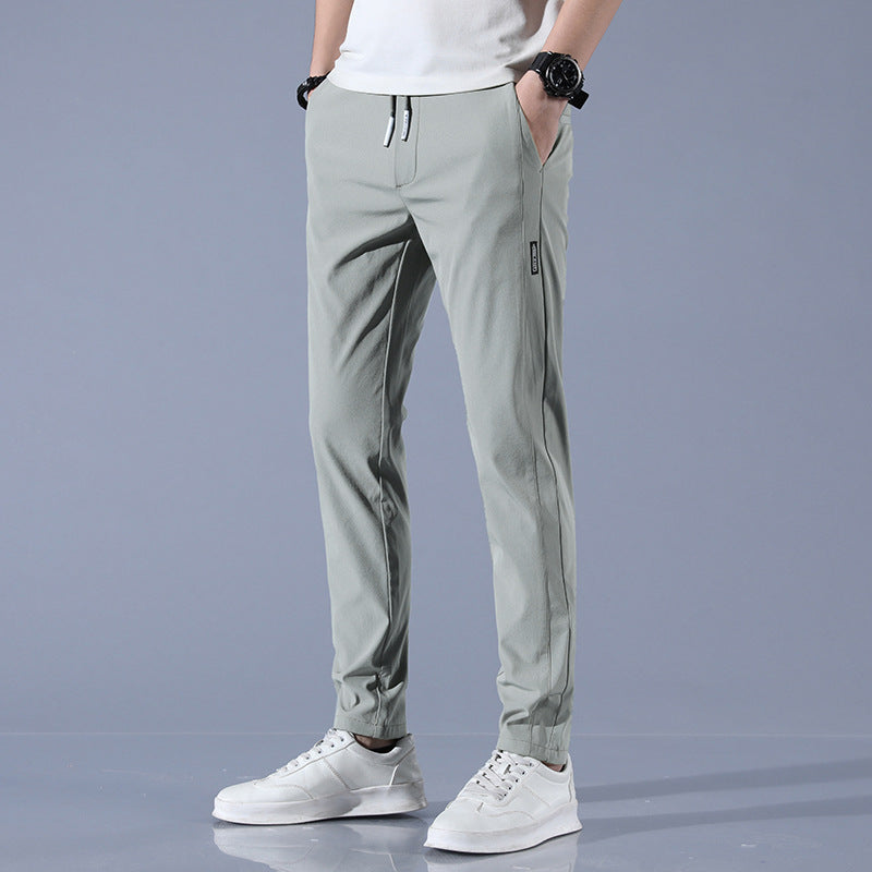 Men's sports pants with adjustable drawstring and zippered pockets on the sides Lune London