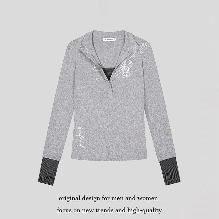 Women’s long-sleeve shirt with Henley button placket, contrast cuffs, and music note print Amarae