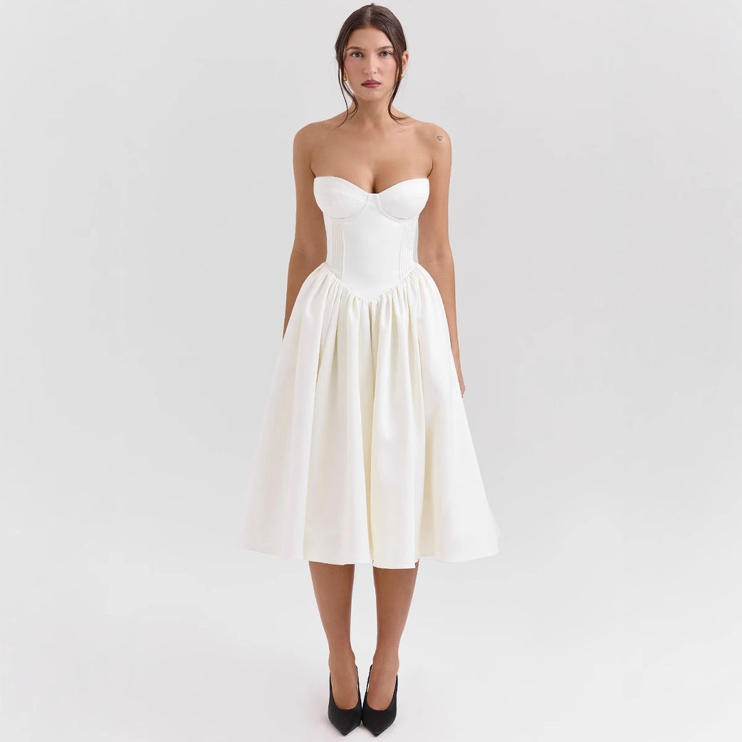 Ladies' couture dress in an off-the-shoulder strap design with a voluminous skirt Lune London
