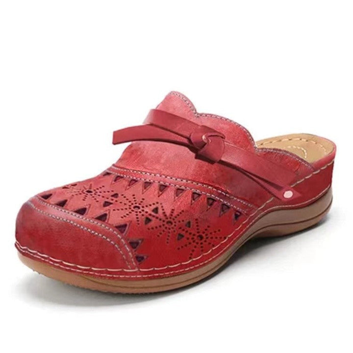 Women's Comfortable Clogs with Filigree Cutout Design and Elegant Strap Lune London