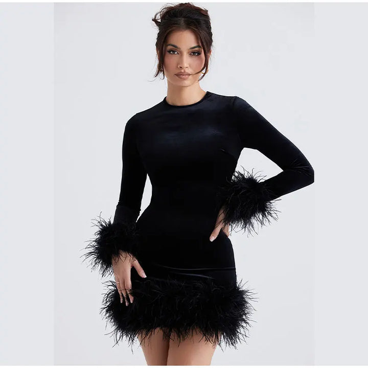 Lune London | Elegant fitted dress with feather embellishments on the sleeves