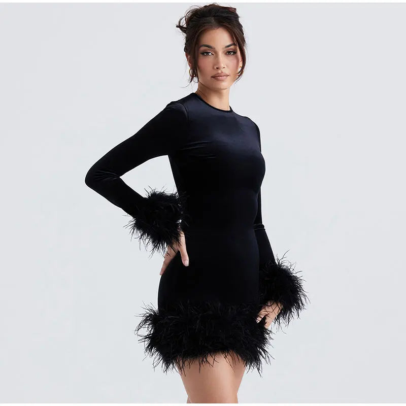 Lune London | Elegant fitted dress with feather embellishments on the sleeves