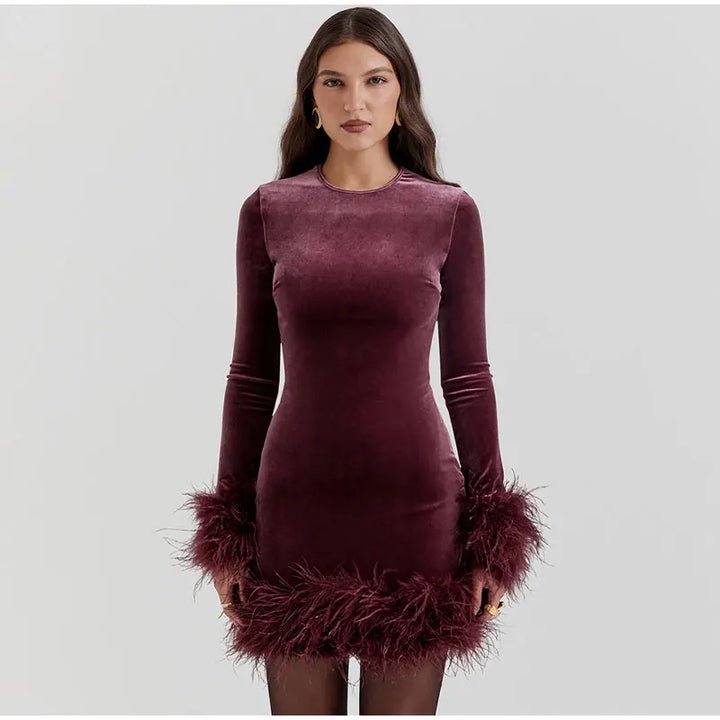 Lune London | Elegant fitted dress with feather embellishments on the sleeves