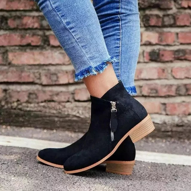 Schwarze orthopädische Lederstiefel mit Absatz und Reißverschluss