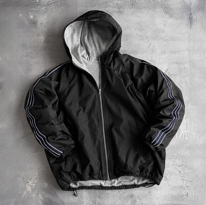 Veste de coupe-vent pour femmes avec capuche doublée et poches latérales Chic & Stil