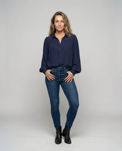 Ladies blouse with voluminous sleeves and elegant ruffle details