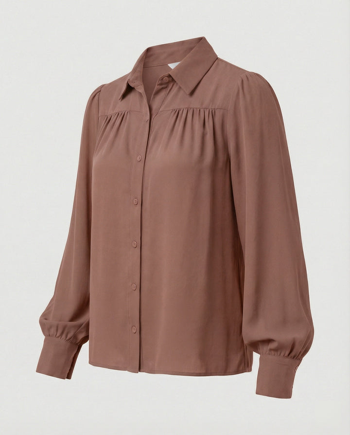 Ladies blouse with voluminous sleeves and elegant ruffle details