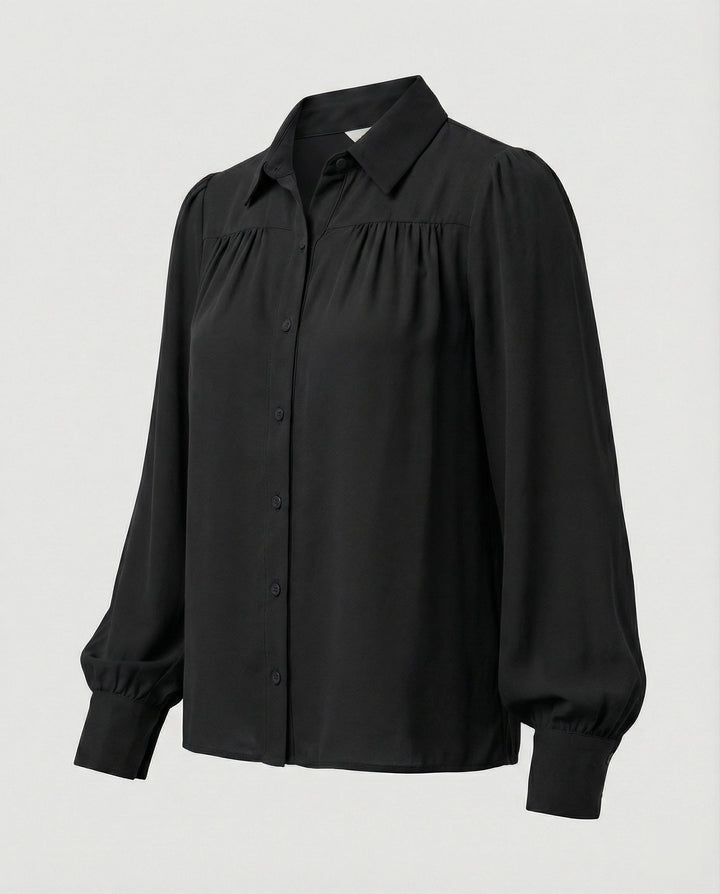 Ladies blouse with voluminous sleeves and elegant ruffle details